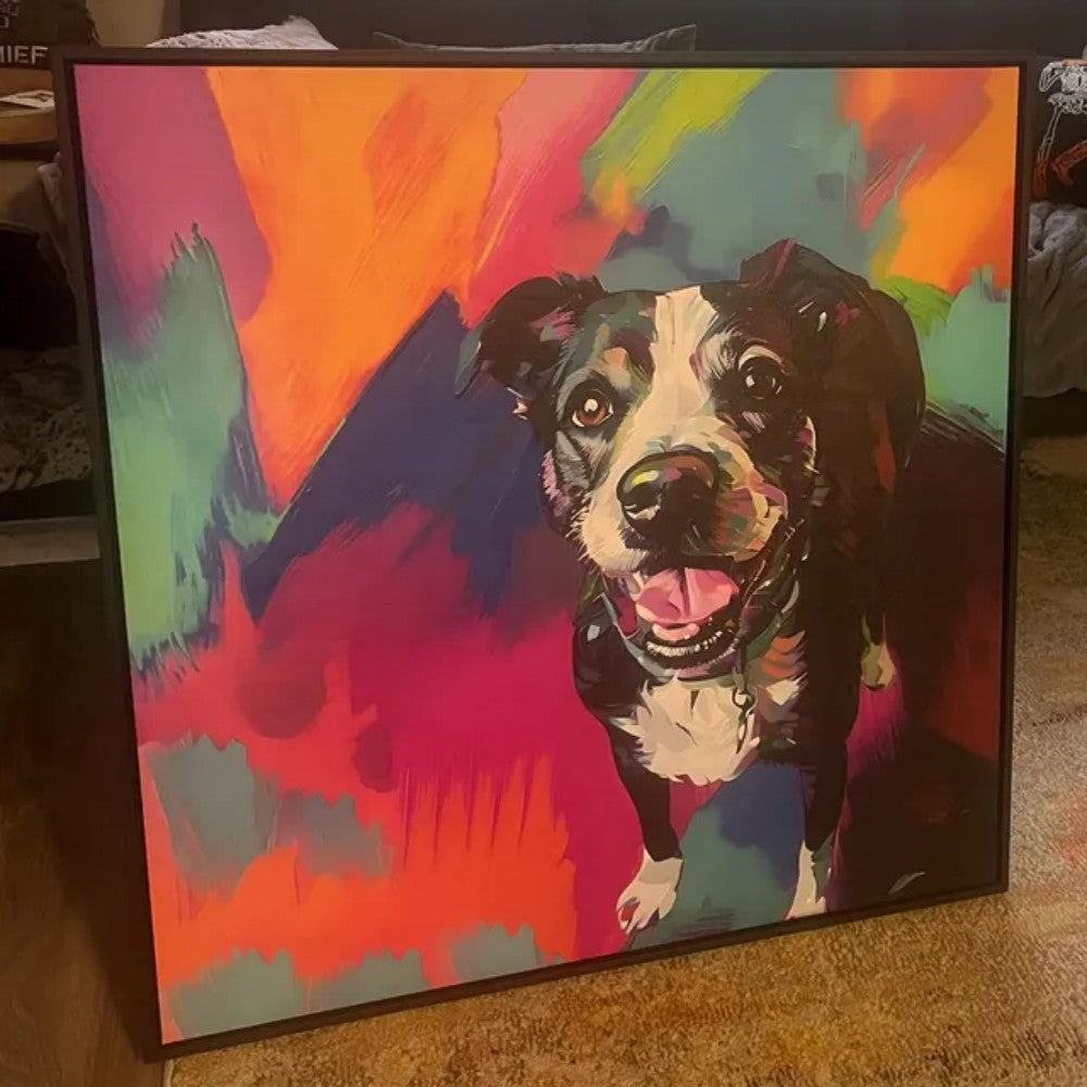 Framed colorful dog portrait displayed inside a home