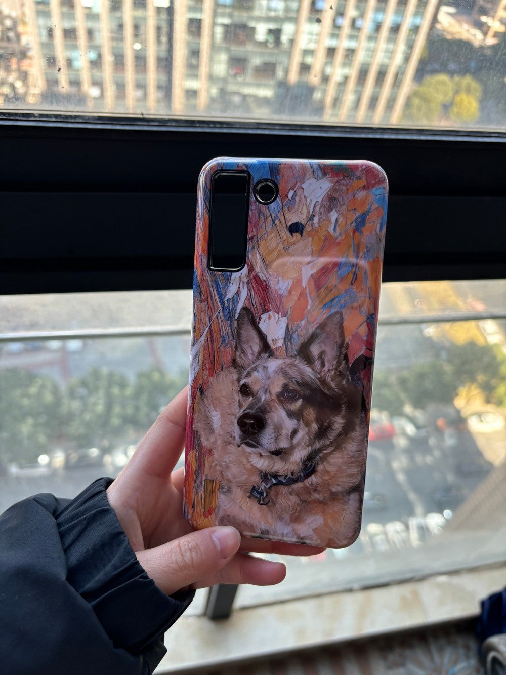 personalized dog phone case held as a physical product example