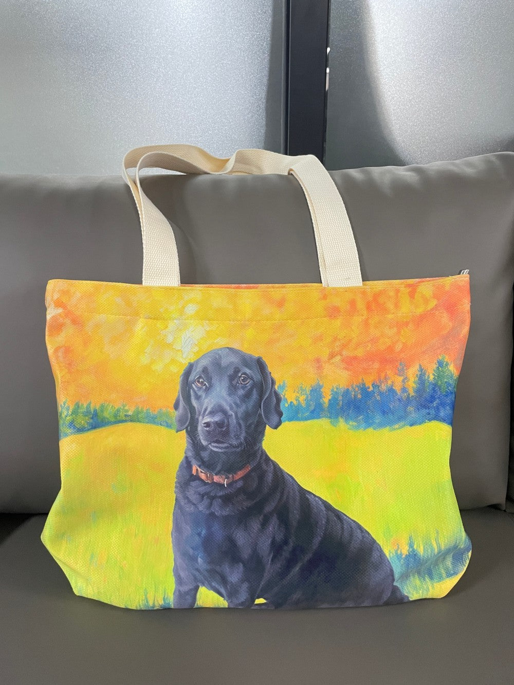 Physical tote bag featuring black dog artwork